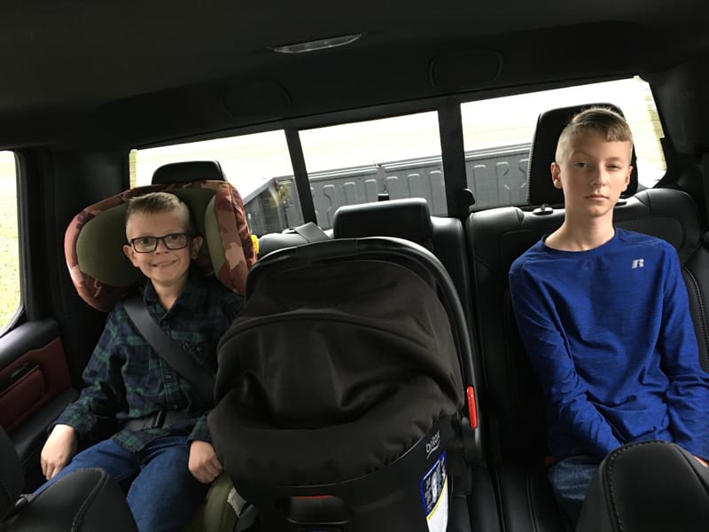 Child Passenger Safety Week Checkup: Are Your Kids Properly Secured? 4 2020 Ram 1500 Eco-Diesel Pickup Truck Rear Seat