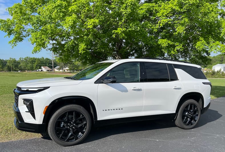 The Ultimate Car Seat Challenge: Which 3-Row SUVs Fit Child Car Seats the Best? 5 A Side View Of The 2024 Chevrolet Traverse