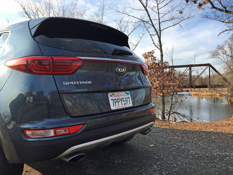 Which 2 Row SUVs Are Best For Child Car Seats? The Ultimate Car Seat Challenge 18 Black Exterior Of Kia Sportage Compact Crossover Rear Trunk