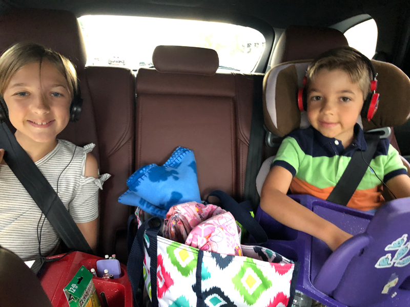 The Best 7 Seater SUVs for Back to School Carpools 3 Mazda Cx-9 Signature Awd 7 Seater Suv Nyc Road Trip Kids In The Backseat