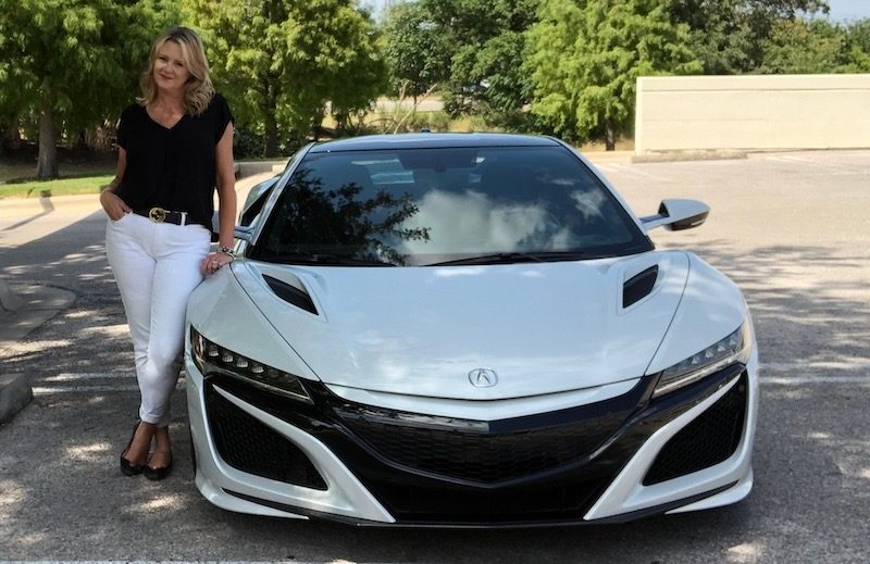 7 Sexy Sports Cars to Fulfill Your Need for Speed 5 Woman Happily Leaning On A White Sports Car