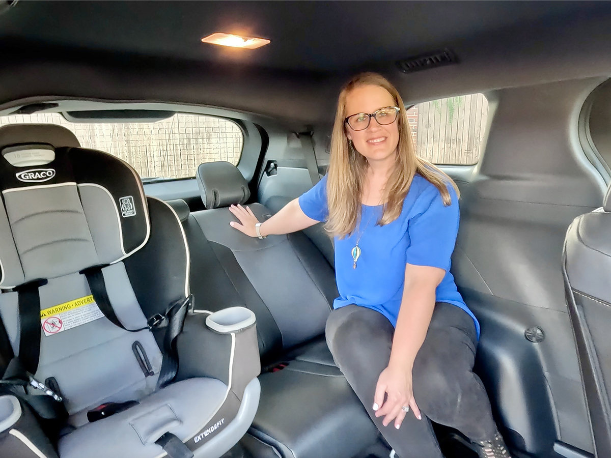A Mom's Take on Why the Toyota Sienna Minivan is so Popular 6 A Girls Guide To Cars | A Mom'S Take On Why The Toyota Sienna Minivan Is So Popular - Sitting In 3Rd Row W Child Seat Toyota Sienna Woodland Edition Holli Fourniquet