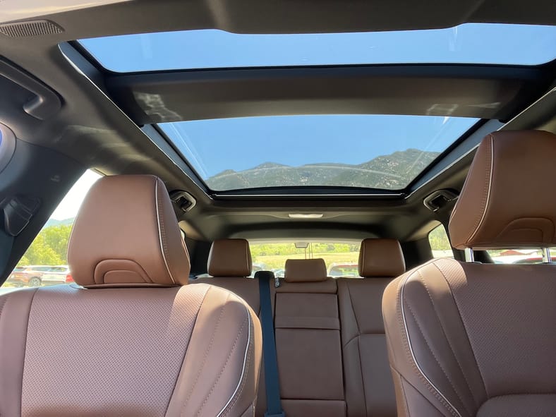 Shhh... the 2025 Toyota Crown Signia Delivers Low-Key Luxury Without the Flash 7 The Cabin Is Brightened By A Large Panoramic Sun Roof