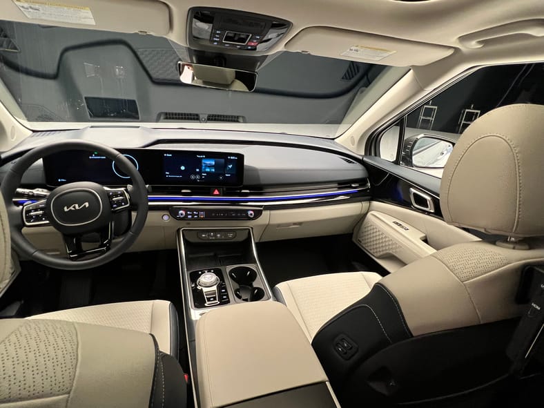 Why We Are SOOOO Excited About the 2025 Kia Carnival—Now Also With a Hybrid Option 5 The Front Seat In The 2025 Kia Carnival Hybrid