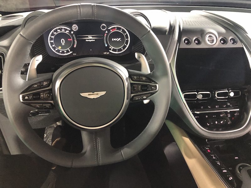 7 Sexy Sports Cars to Fulfill Your Need for Speed 4 The Black Steering Wheel And Interior Of Aston Martin Dbx