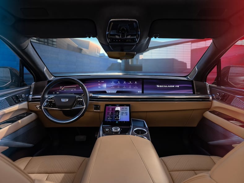 Why We're So Excited to Drive the Cadillac Escalade IQ... It'll Be Worth the Wait 6 Forward-Facing View Of Cadillac Escalade Iq Interior And 55-Inch Pillar-To-Pillar Screen From The Rear Seat.