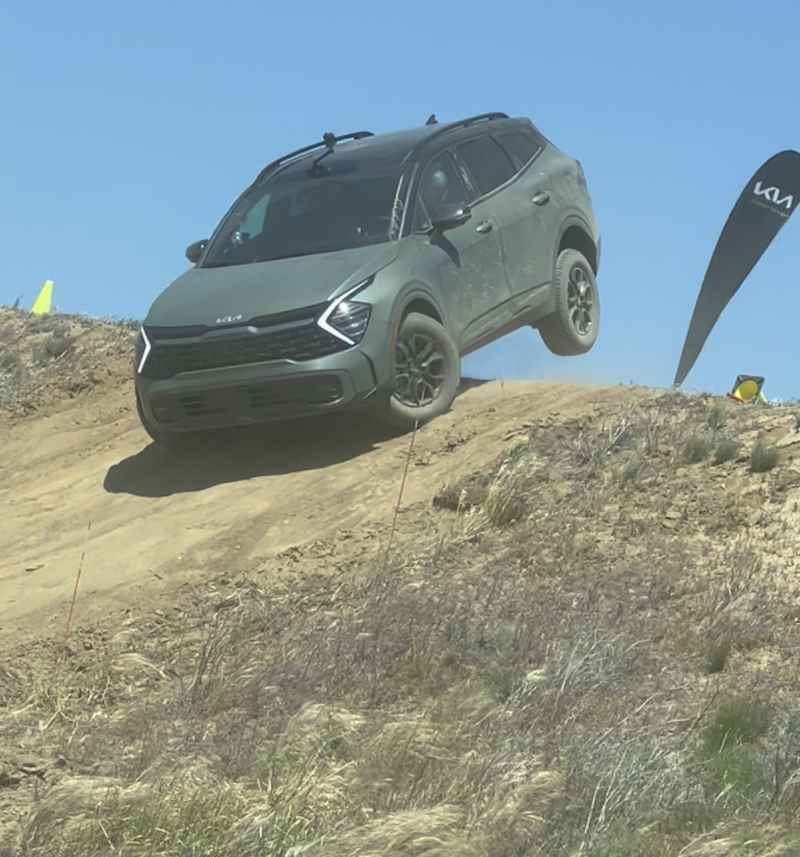 The 2023 Kia Sportage Hybrid and X Models: Premium, Capable SUVs That Will Rock Your World 7 Yes, We Drove Over This Hill; It'S Wild When You Can Feel Your Wheels Off The Ground